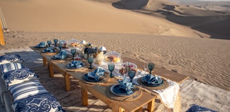 Sunset Picnic in the Desert Dunes