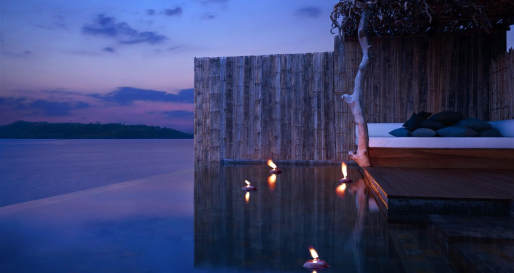 Water villa deck at night  - Song Saa