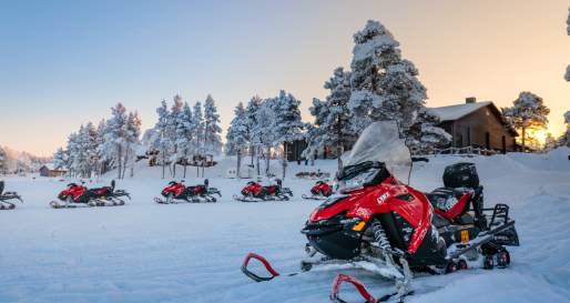 Snowmobiles by the main building 
