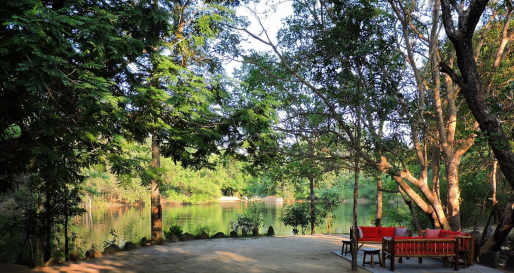 Sofa beside the water - Shergarh Tented Camp