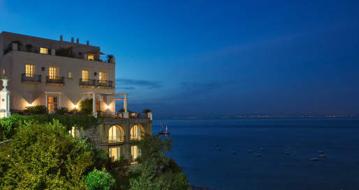 Exterior at night - JK Place Capri