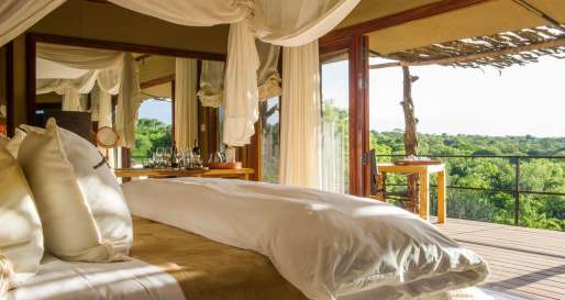 Tent interior and view - Mwiba River Lodge