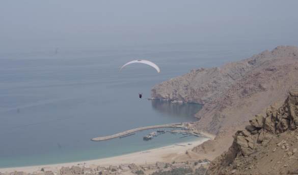 Paragliding into Zighy Bay