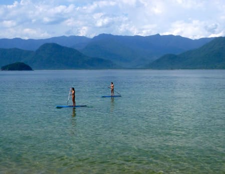 Stand-up paddleboarding at Pousada Picinguaba