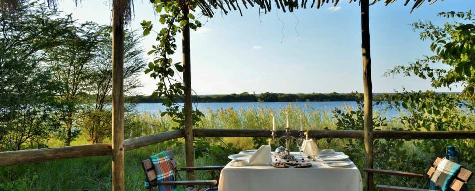 Dining on deck - Chobe Bakwena Lodge