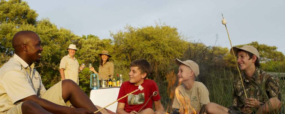 Sitting around camp fire 