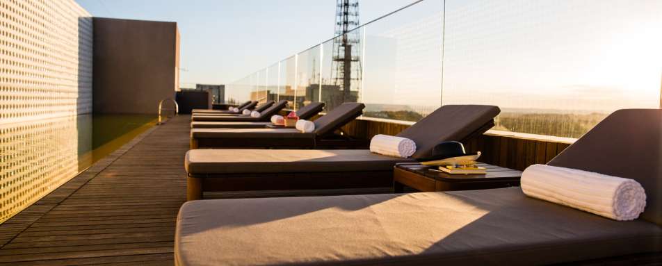 Rooftop pool and loungers