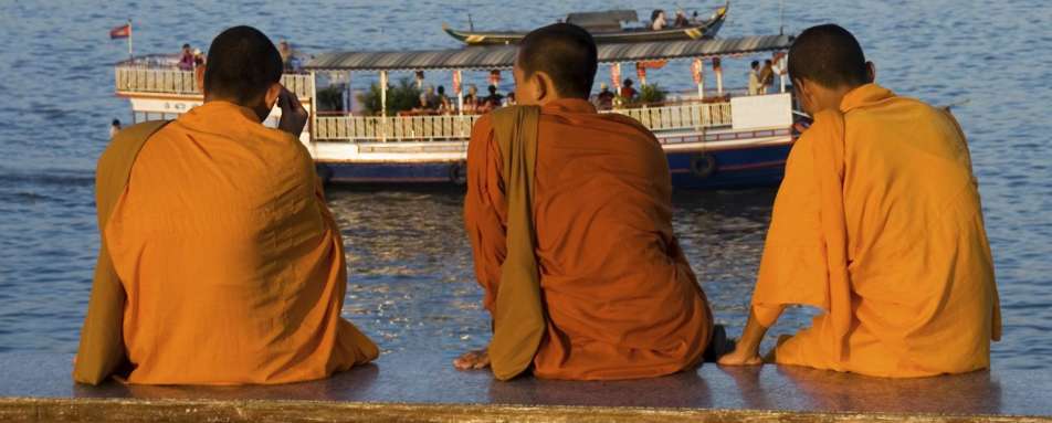 Passing Boat - Discover Phnom Penh