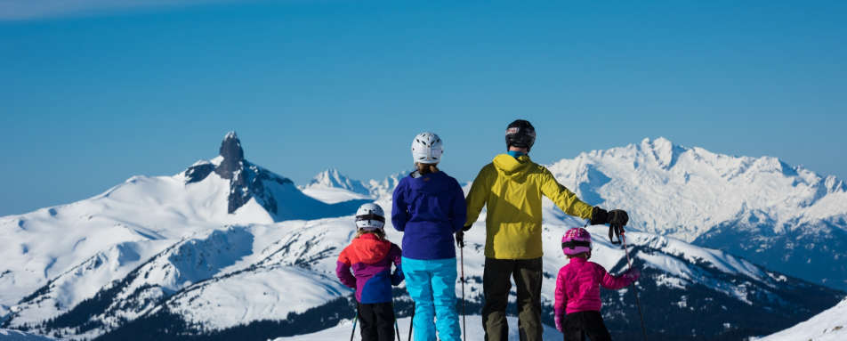 Family skiing together in Whistler 