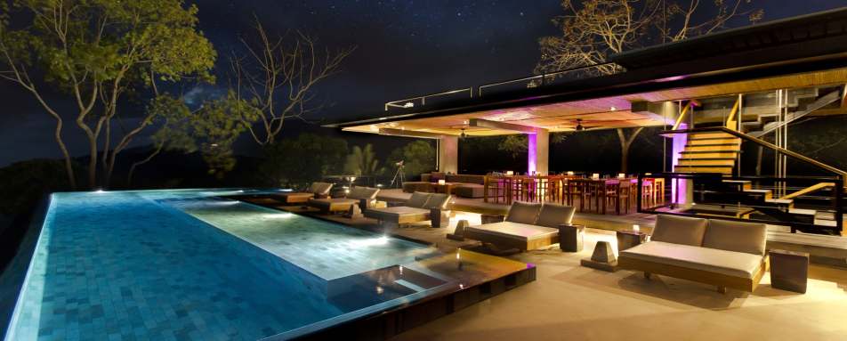 Pool at night - Kura Design Villas