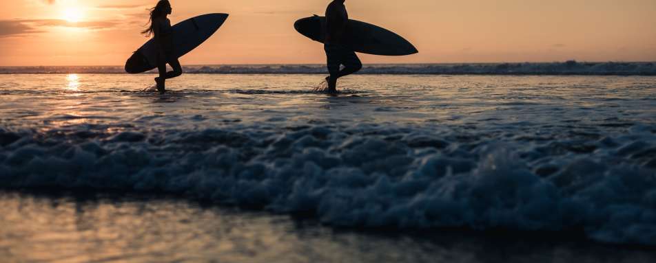Surfing in Canggu - COMO Echo Beach