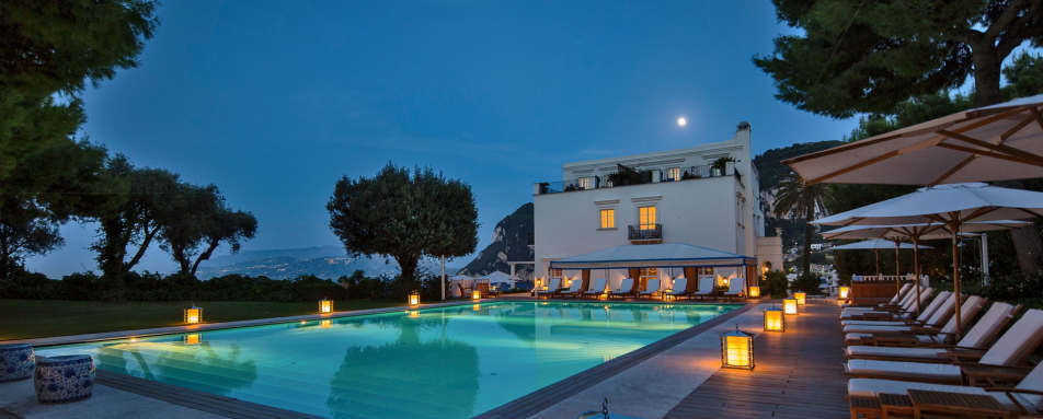 Pool at night - JK Place Capri