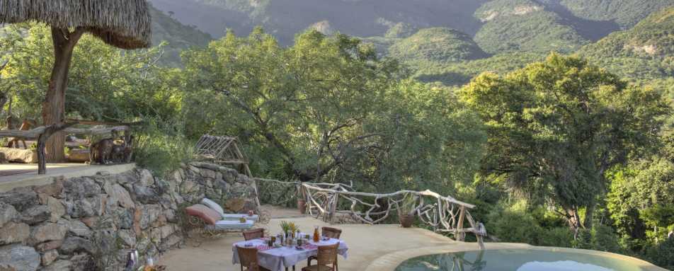 Dining by swimming pool 