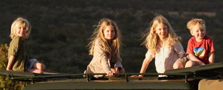Kids on vehicle - Safari and beach for families in Kenya