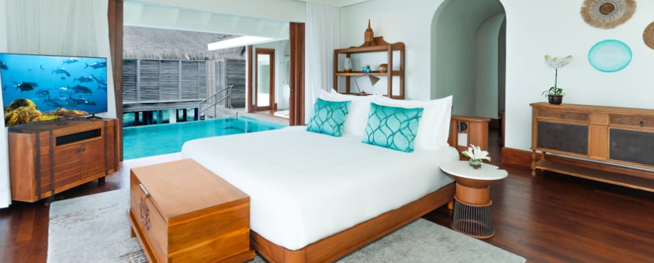 Over Water Pool Villa Bedroom and Pool 