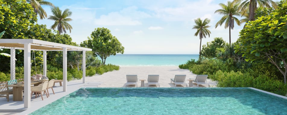 Two bedroom beach villa with poll outside 