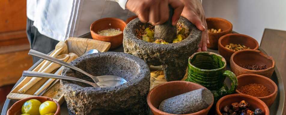 Chef preparing a traditional Pasilla Chili Sauce 