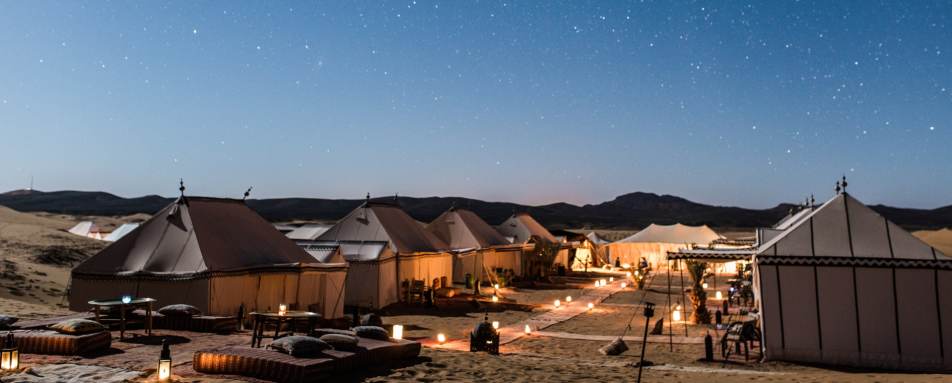 Camp at night - Desert Luxury Camp