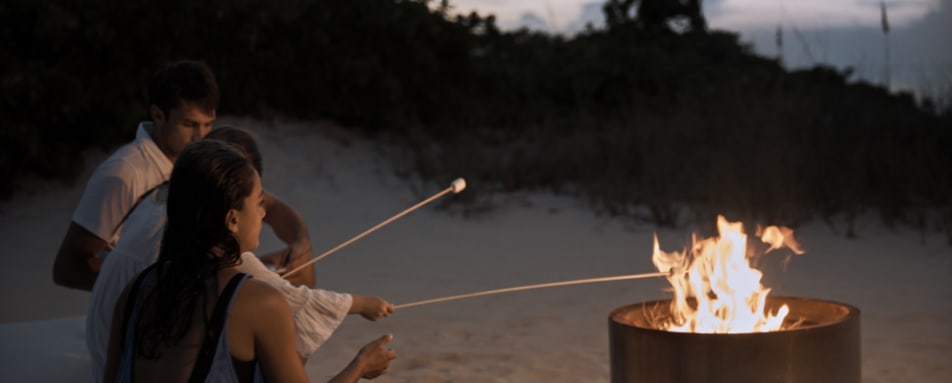 family tiasting marshmallows 