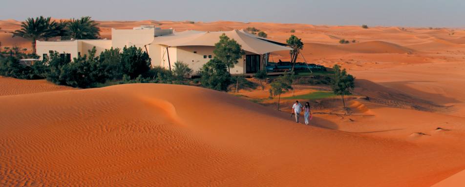 Climbing the dunes - Al Maha Desert Resort and Spa