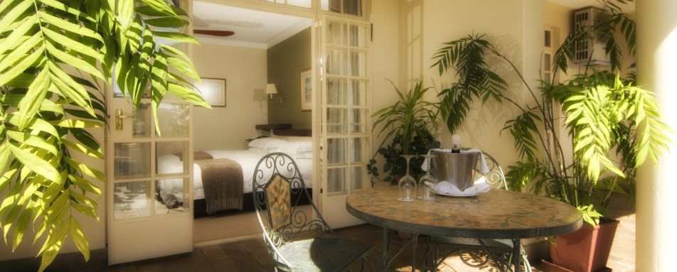 Patio and deluxe room - Ilala Lodge