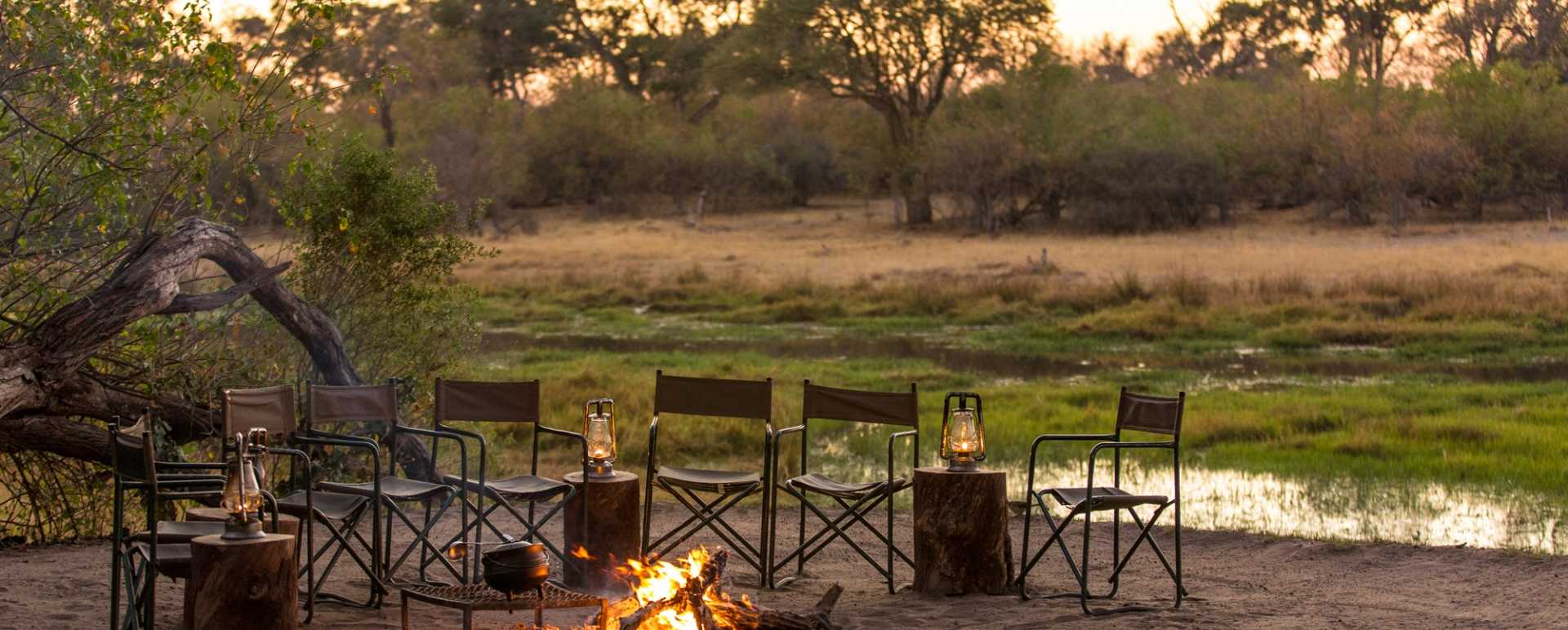 Camp fire, river - Machaba Camp