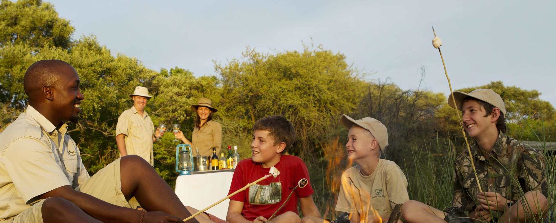 Sitting around camp fire 