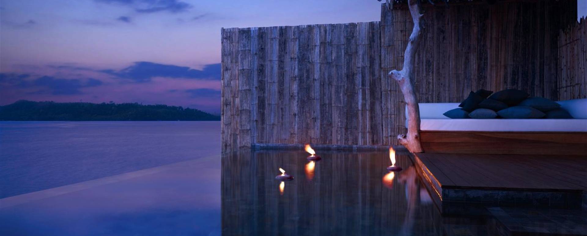Water villa deck at night  - Song Saa