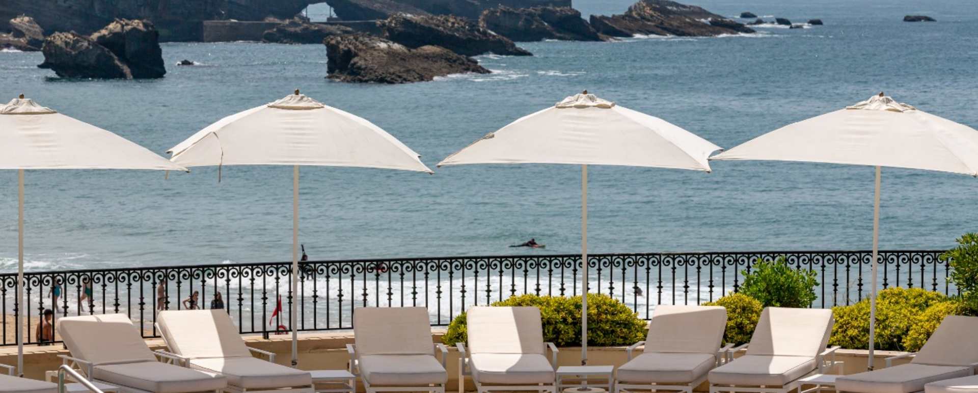 Sunlounges by the swimming pool 