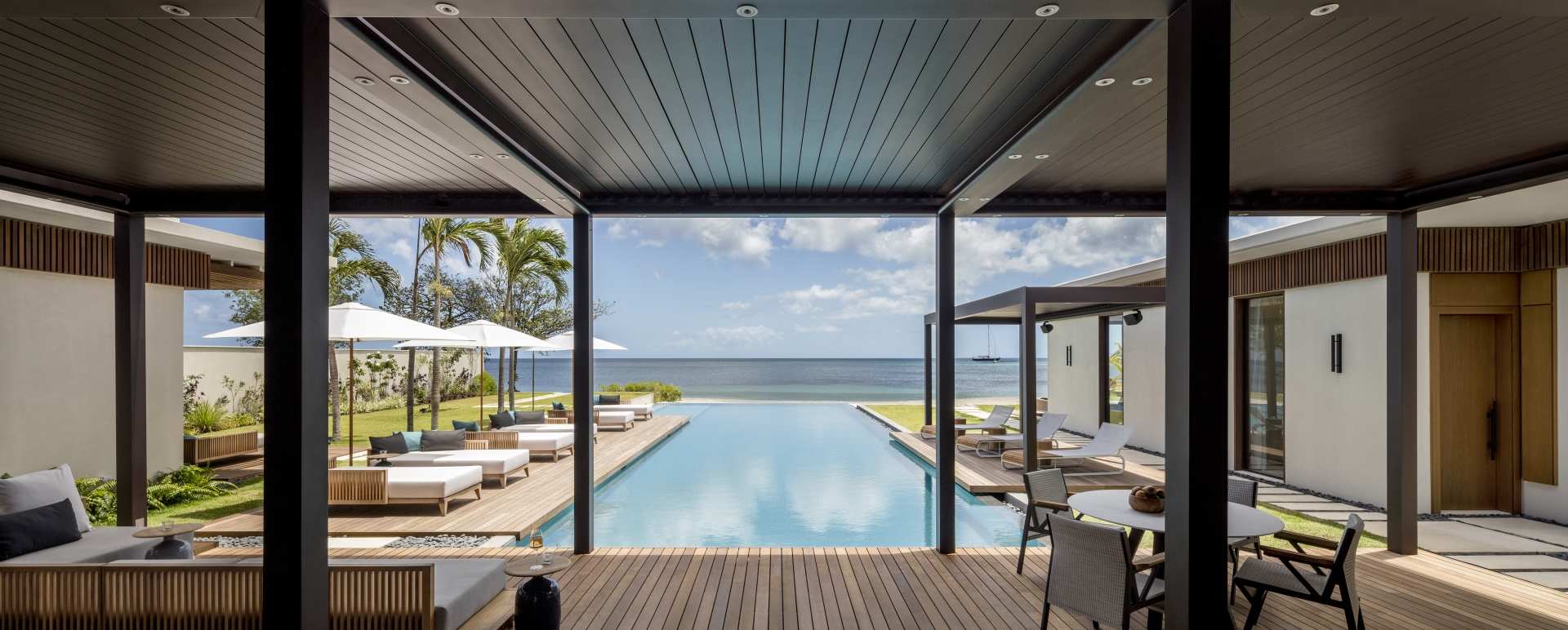 Beachfront Villa pool deck and beach view     