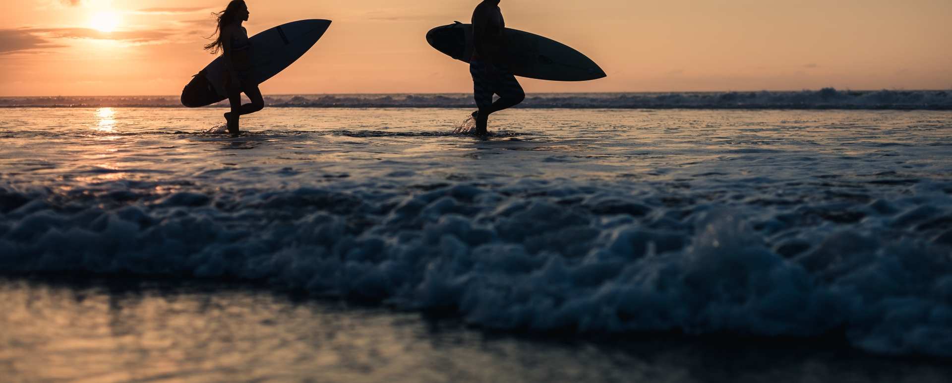 Surfing in Canggu - COMO Echo Beach