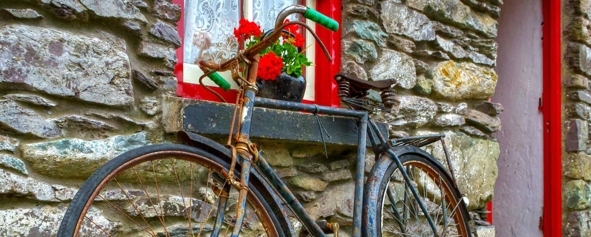 Bicycle outside cottage - Classic Ireland