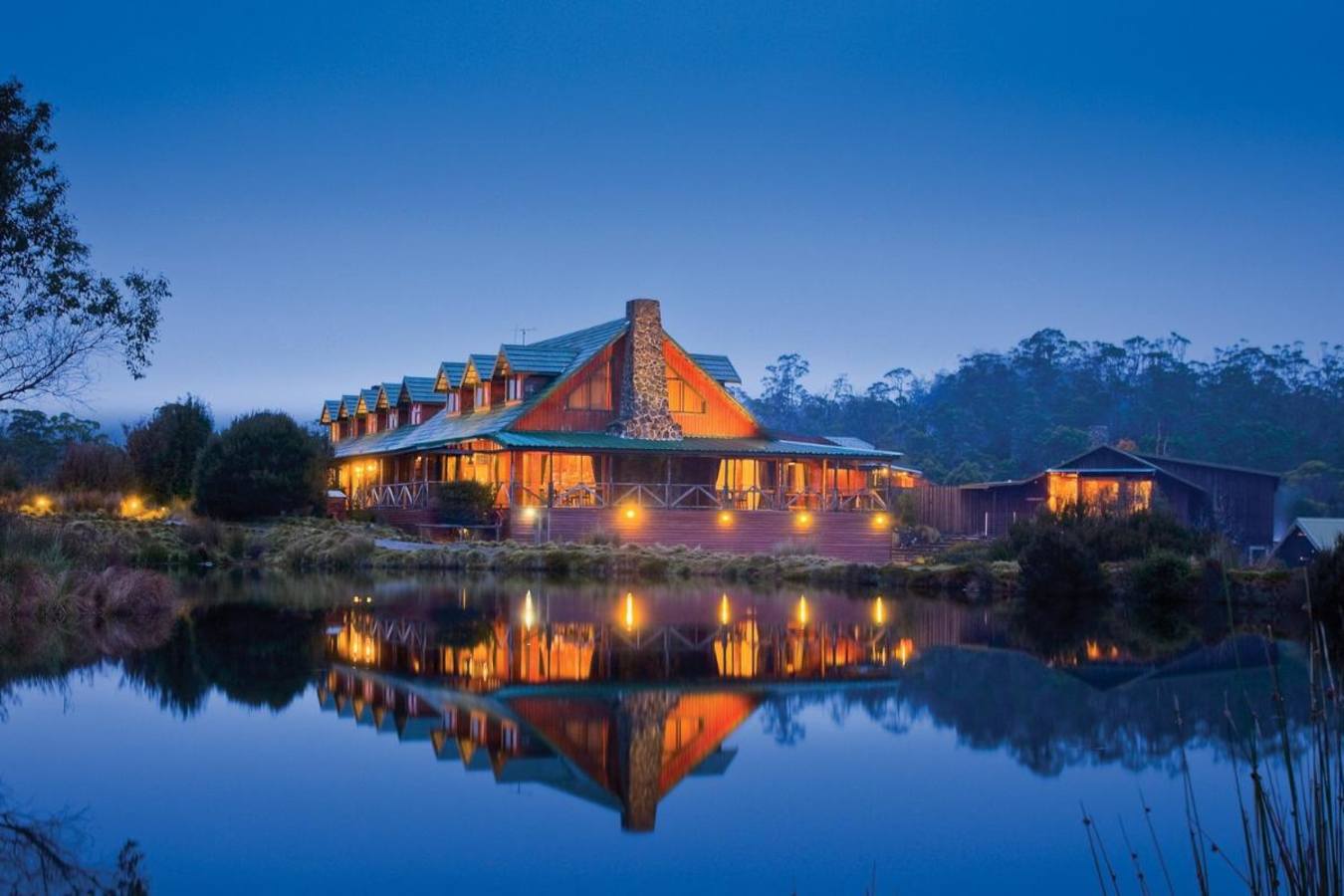 Exterior by night - Cradle Mountain Lodge