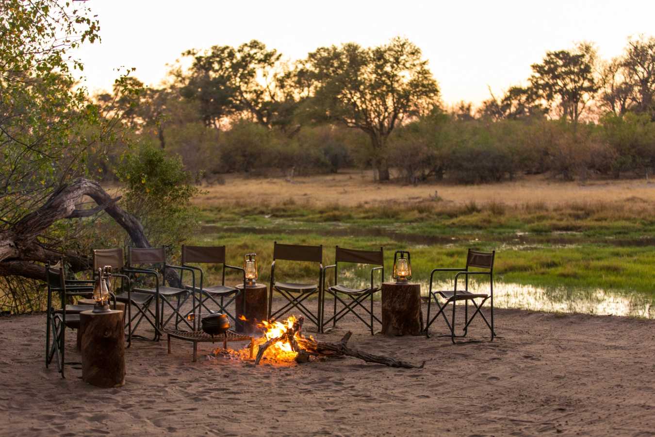 Camp fire, river - Machaba Camp