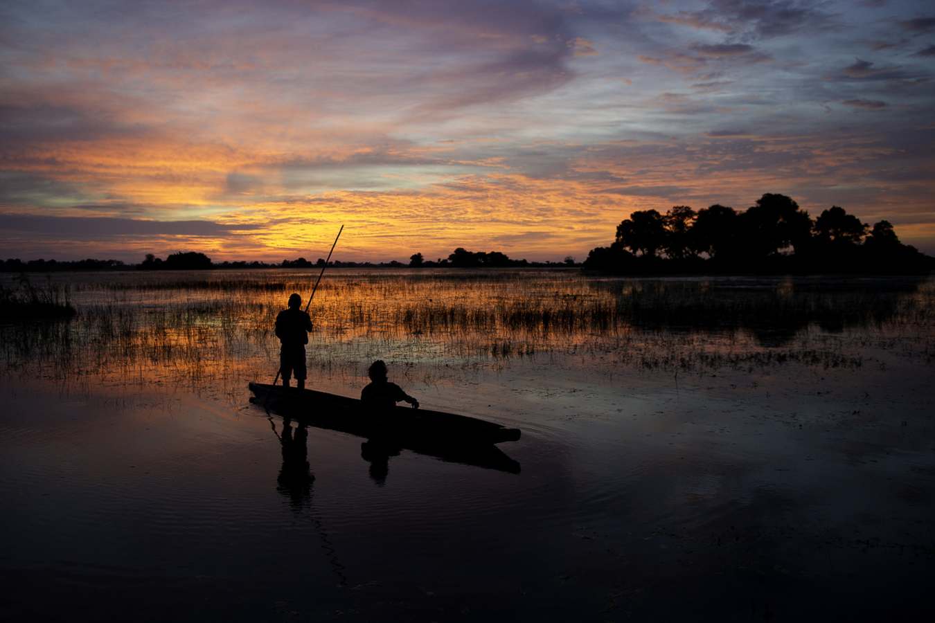 Sunset from a mokoro - Tubu Tree Camp