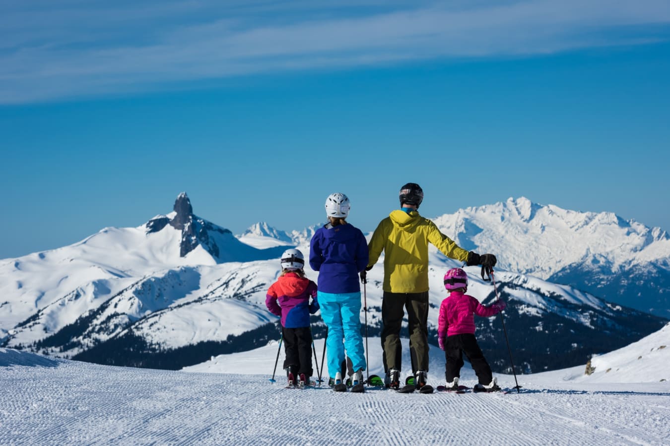 Family skiing together in Whistler 