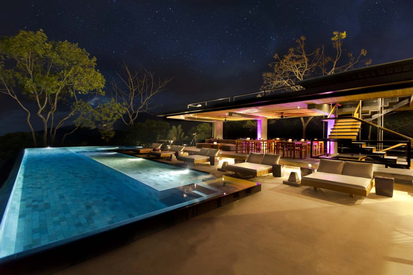 Pool at night - Kura Design Villas