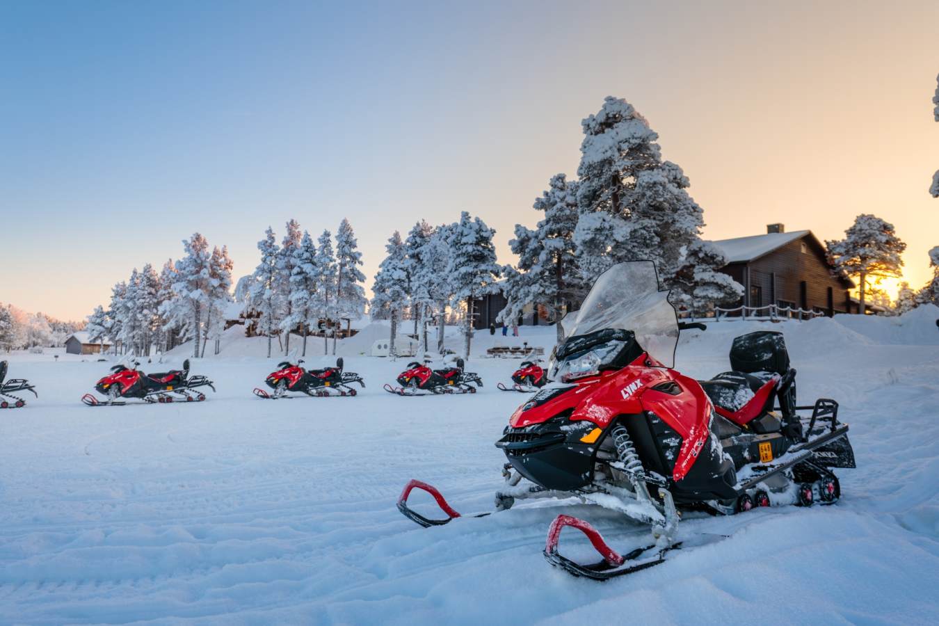 Snowmobiles by the main building