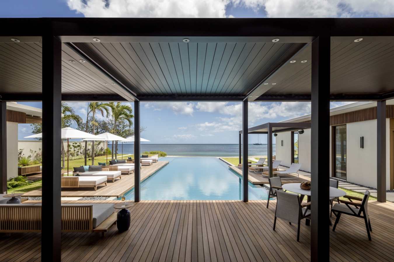 Beachfront Villa pool deck and beach view