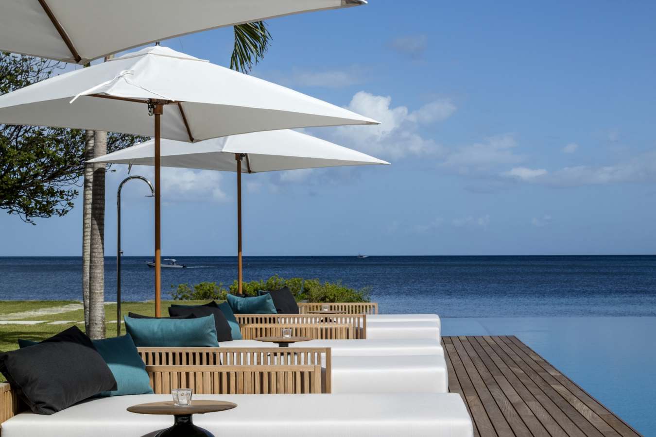 Beachfront Villa chaise longues on the deck