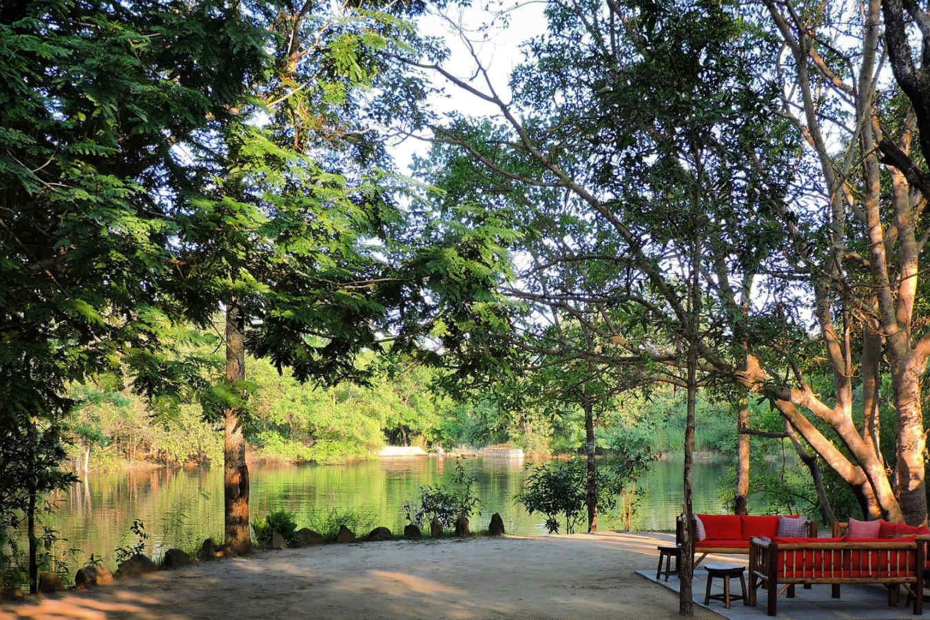 Sofa beside the water - Shergarh Tented Camp