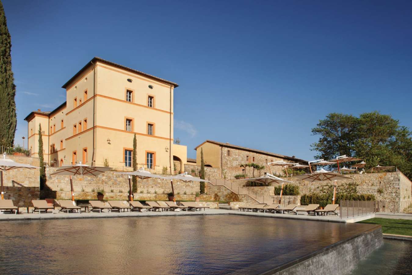 Main Hotel from Poolside - Belmond Castello di Casole