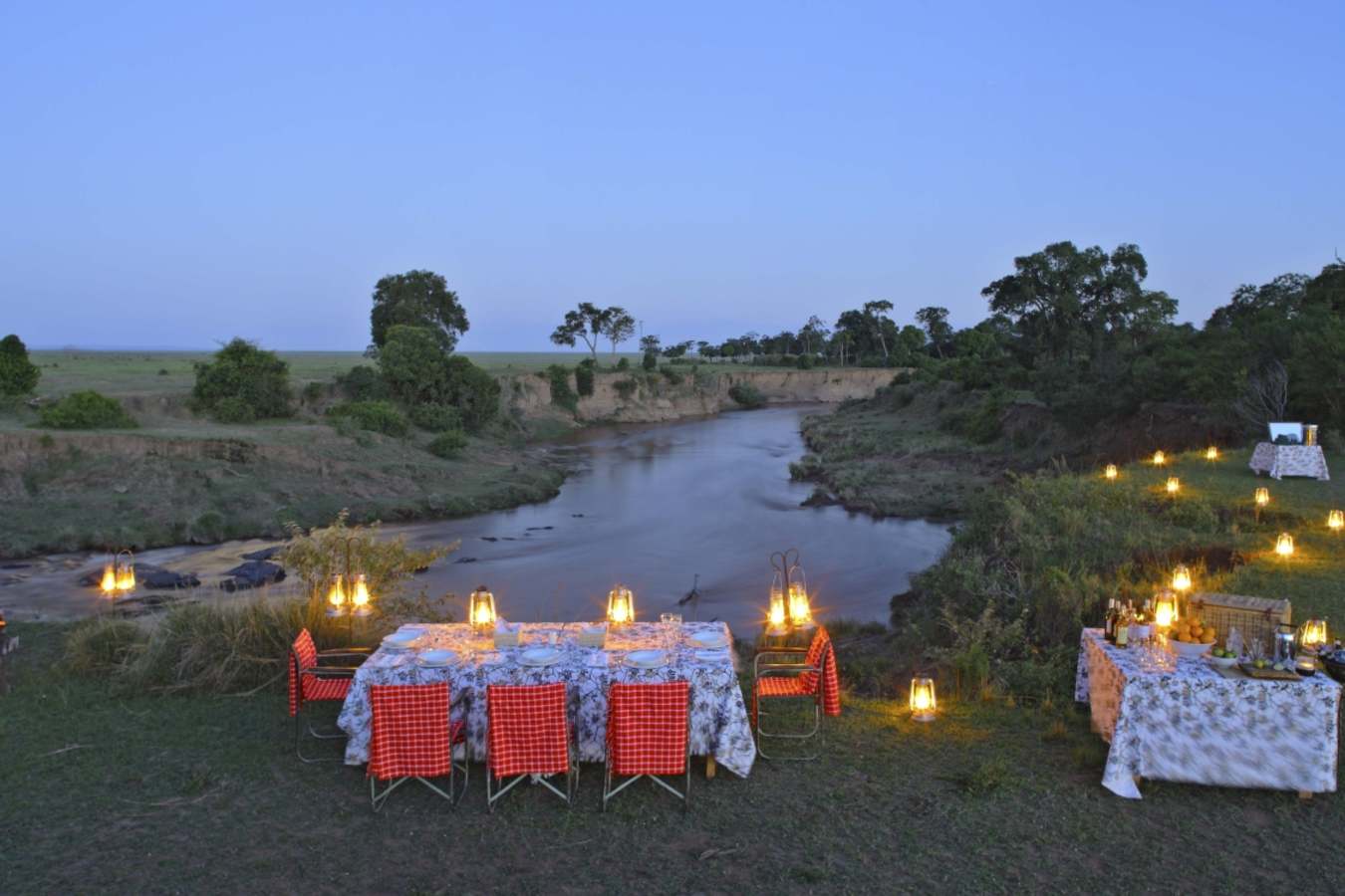 Riverside dining - Bateleur Camp at Kichwa Tembo