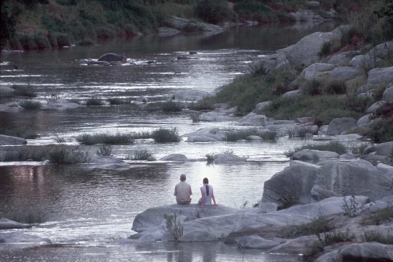 Honeymooners enjoy a sundowner - Rekero Camp