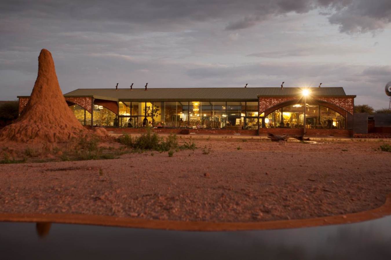 Okonjima Plains Camp - The barn from the waterhole