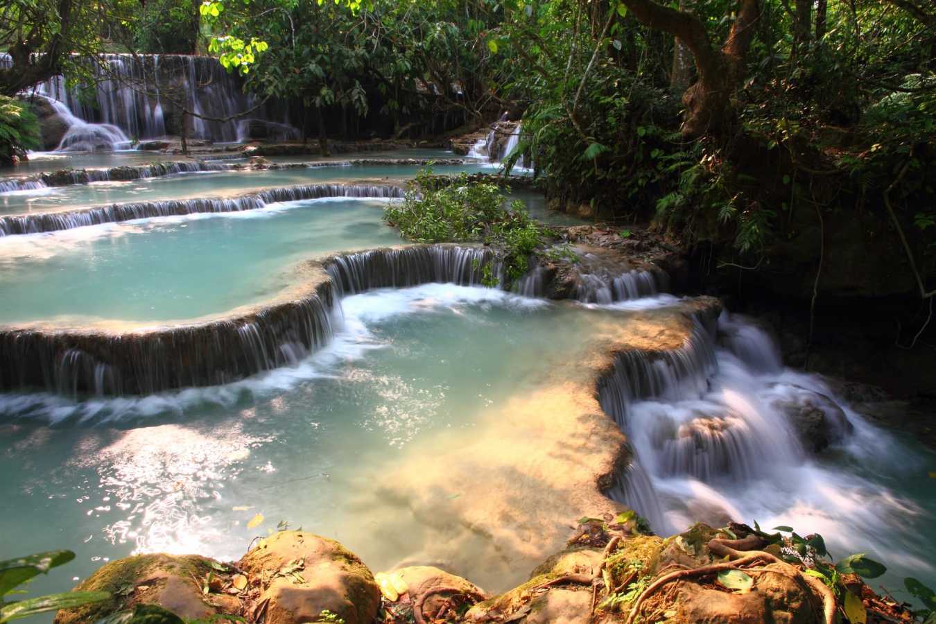Visit Kuang Si Waterfalls