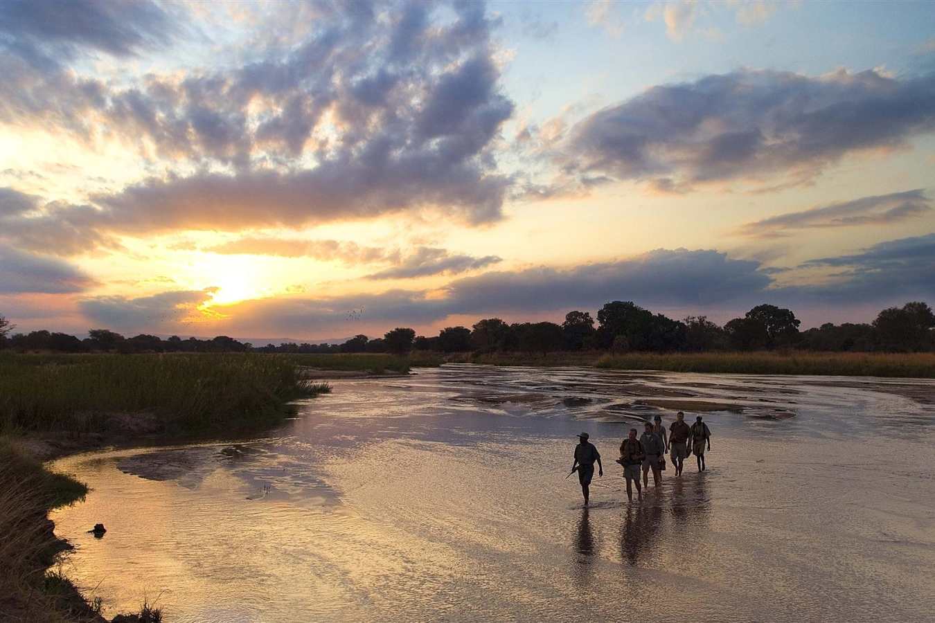 Walking across the Mupamadzi River - Walk Zambia