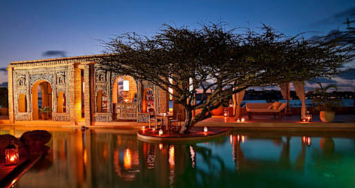 Pool by night - The Majlis Hotel