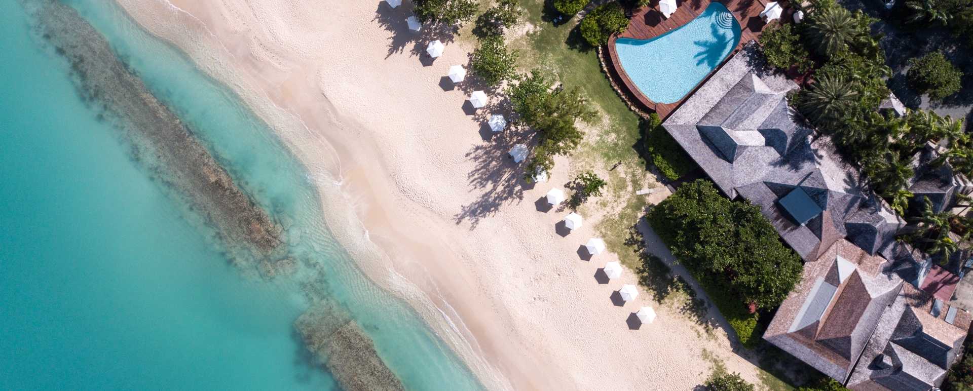 Beach and Reef aerial Hermitage Bay 