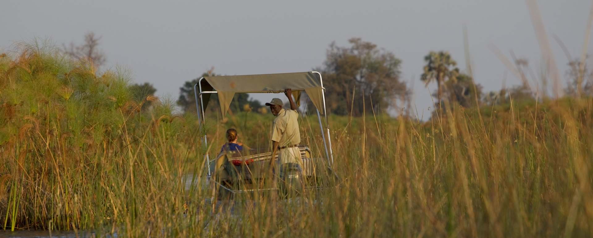 Boat trip on channels - Essential Botswana